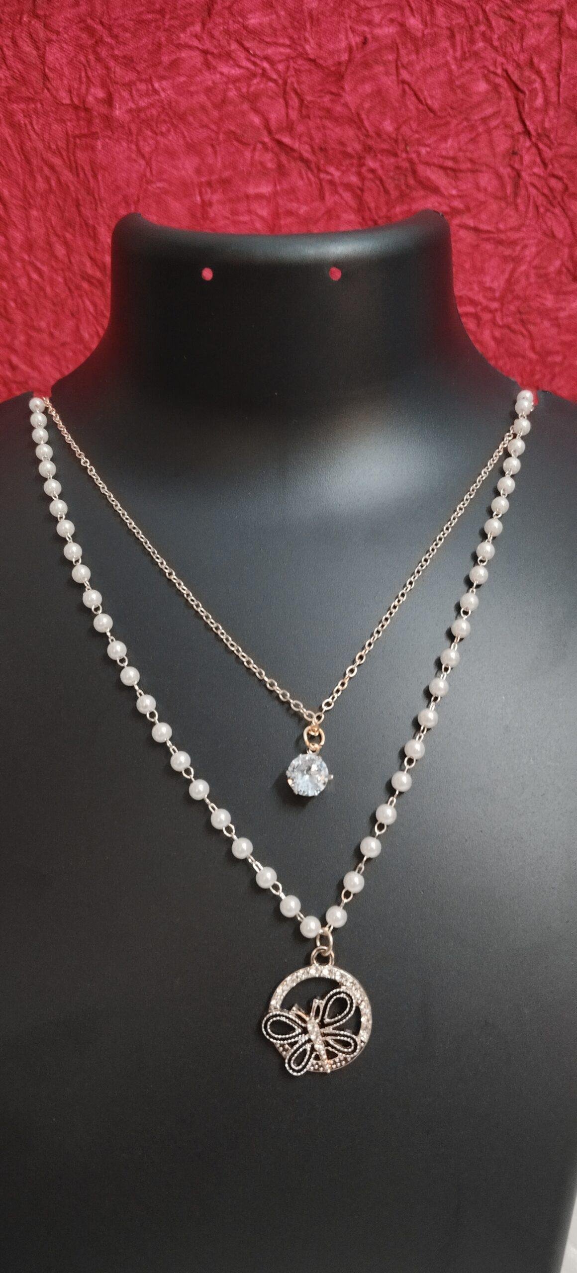DSC002-scaled-1.jpg Elegant Double-Layered Pearl & Butterfly Pendant Necklace - Image 1