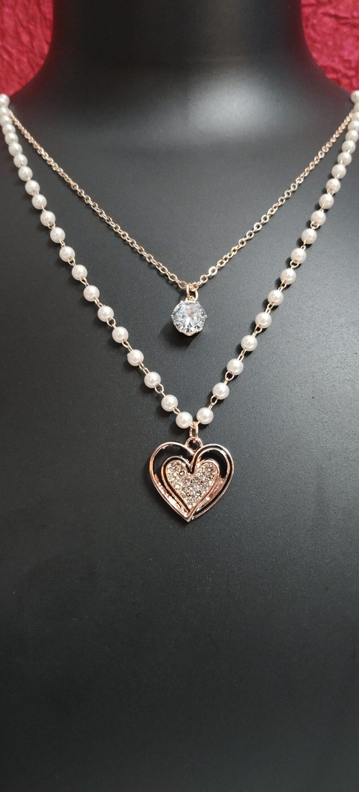 DSC003-scaled-1.jpg Elegant Double-Layered Pearl & Heart Pendant Necklace - Image 1