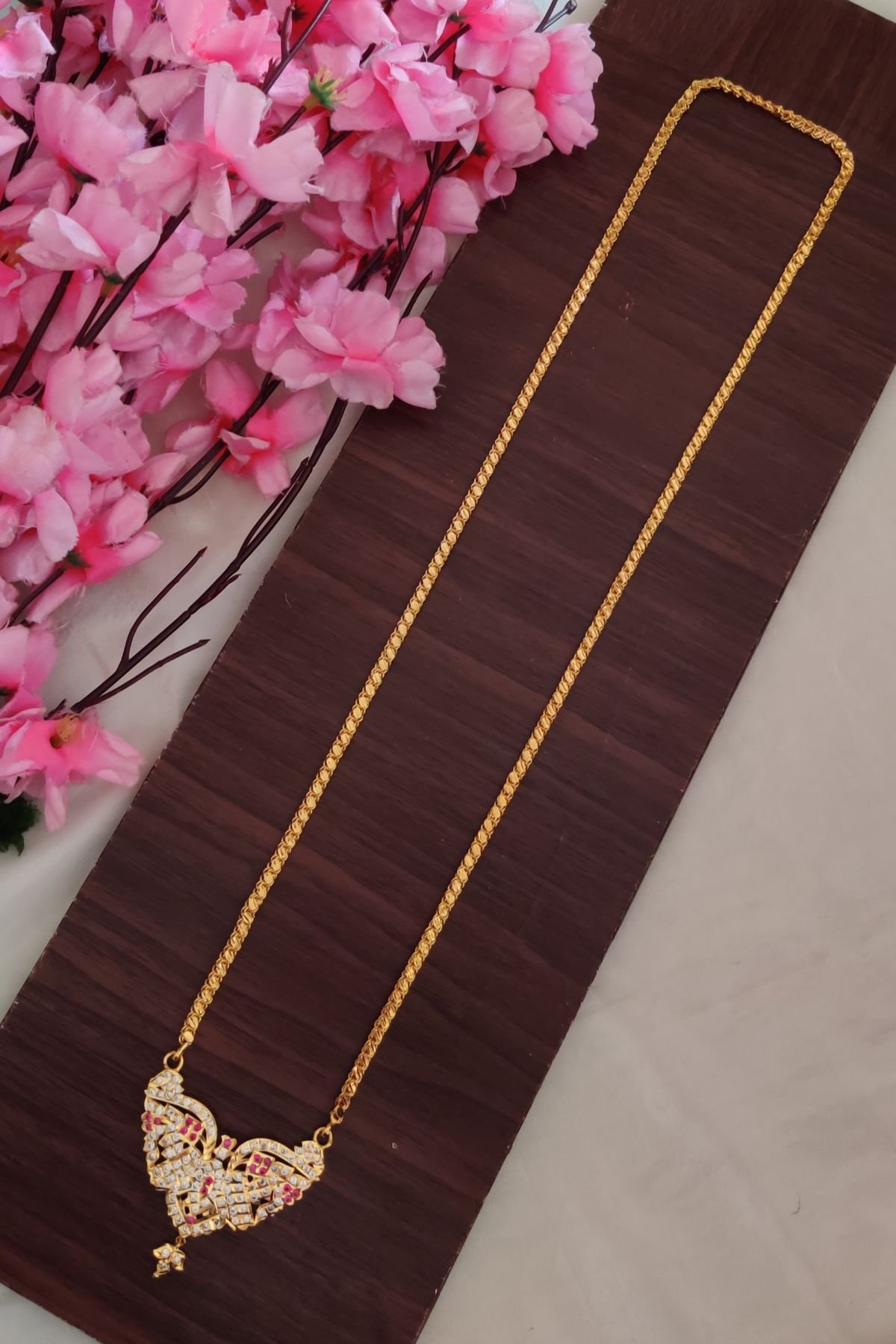 IMG_20251220_131838-1.jpg Eagle Designer White&Pink Stone Dollar Chain - Image 1